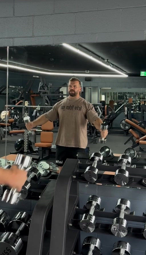 Jake wearing the brown LETS FCKN GO Washed Tee at the gym